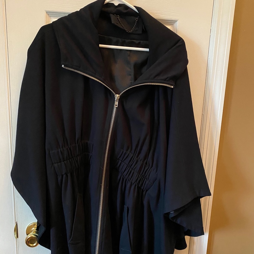 Black jacket. Has sleeve pocket
